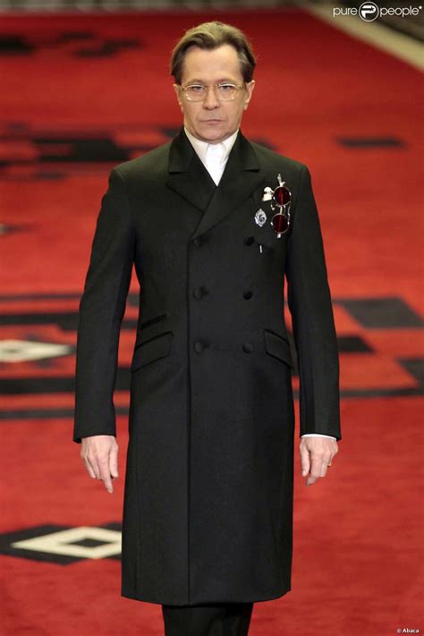 gary oldman in Prada